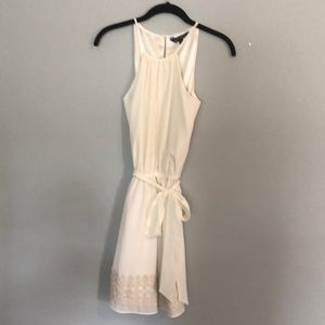 Express cream dress with tie around waist